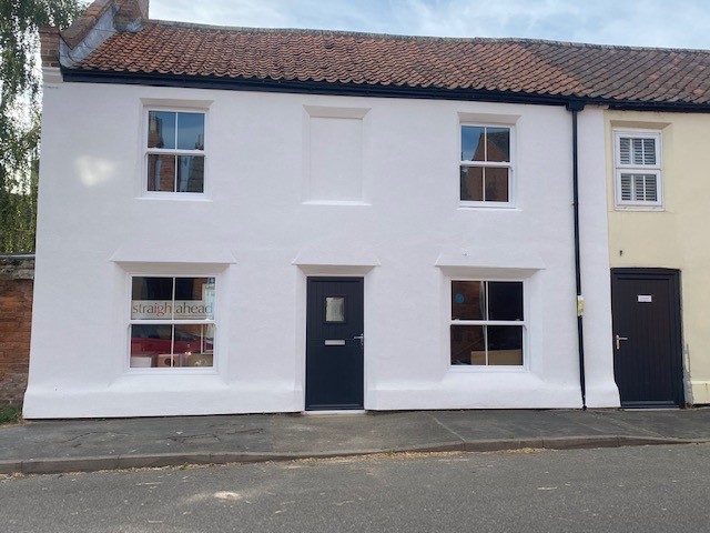 White period building looking out onto Billingborough High Street